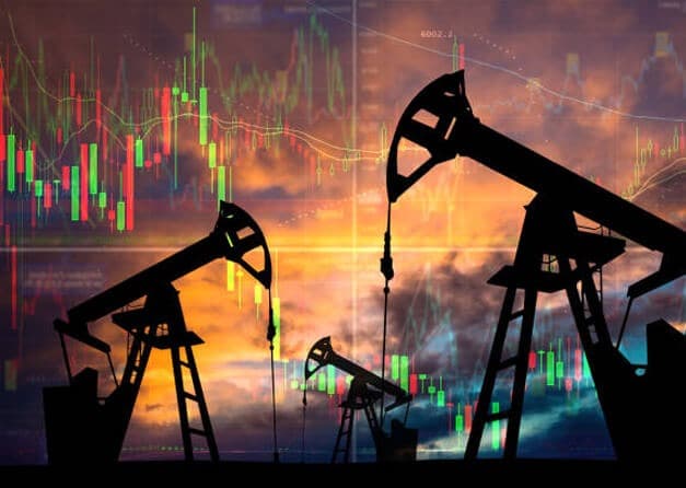 Silhouetted oil pumps against a dramatic sunset sky, overlaid with a candlestick chart showing oil price fluctuations.